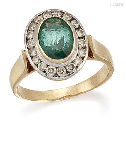 An emerald and diamond cluster ring, the collet-set oval-cut emerald with channel-set brilliant-