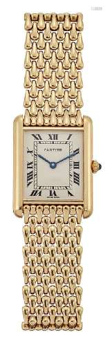 An 18ct gold 'Tank' quartz wristwatch by Cartier, the rectangular dial with Roman numerals and