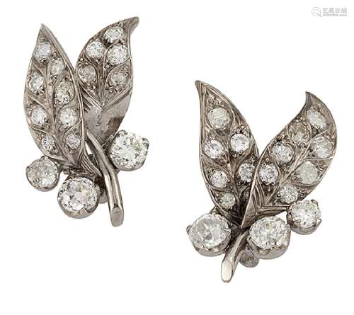 A pair of diamond earrings, of bud and twin leaf design set throughout with old brilliant-cut