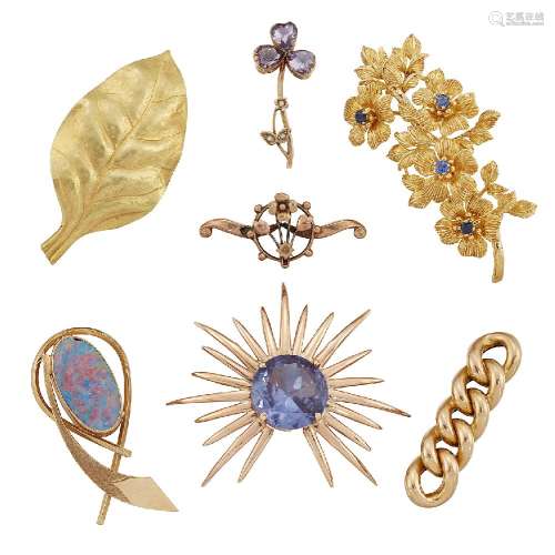 Seven brooches, including: a floral spray brooch with sapphire points; a flower brooch with amethyst