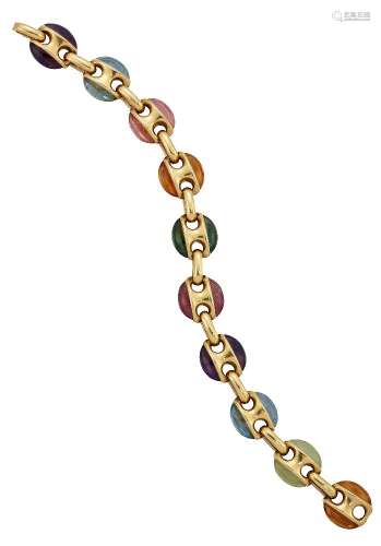 A multi-gem bracelet, each figure-of-eight design link set to each side with a single oval