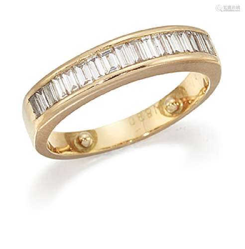 A diamond ring, of half-hoop design composed of a single-row of eighteen graduated baguette-cut