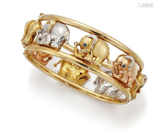 A three-colour bangle, the hinged openwork hoop composed of a line elephants each with circular-