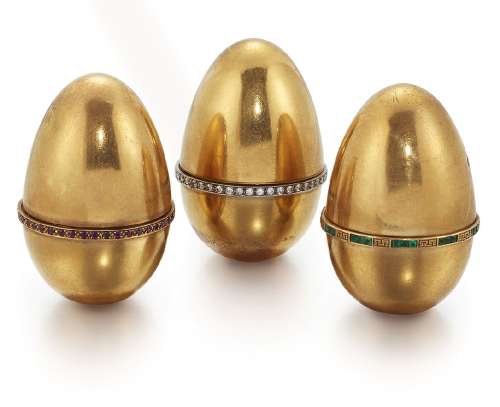 Three 18ct gold diamond and gem egg design ornamental novelty boxes, with screw fittings, each egg
