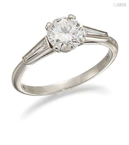 A platinum, diamond single stone ring by Cartier, the brilliant-cut diamond, weighing