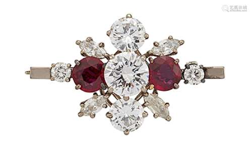 A ruby and diamond brooch, the graduated brilliant-cut diamond and ruby five stone line with