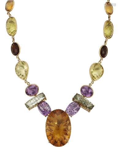 A quartz necklace, the central large fancy-cut oval citrine to a series of vari-shaped fancy-cut