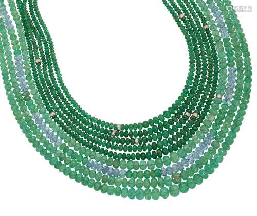 An Emerald, aquamarine and diamond necklace, composed of three rows of graduated faceted emerald