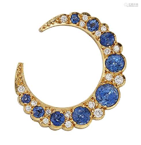 An 18ct gold sapphire and diamond crescent brooch, the graduated circular-cut sapphires with