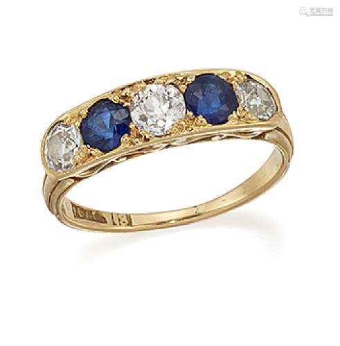 A diamond and sapphire ring, of half-hoop design, composed of three old brilliant-cut diamonds