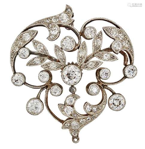 A late Victorian diamond cluster brooch, of scrolling foliate openwork design set with old-brilliant