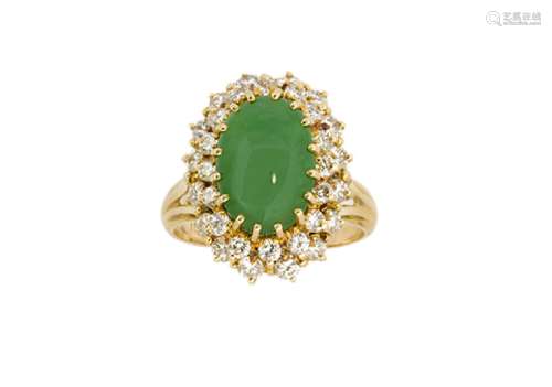 A jadeite jade and diamond cluster ring, the oval jade cabochon to a brilliant-cut diamond double