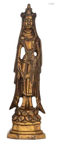 An Oriental gilt bronze female figure, standing on…
