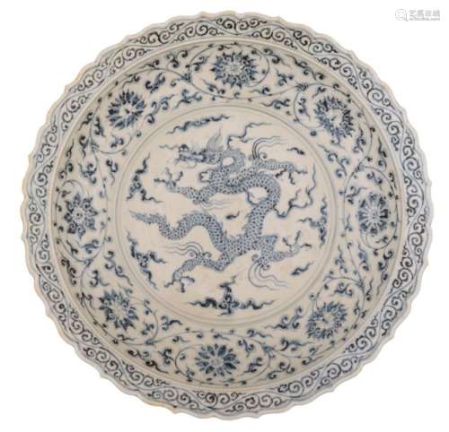 A large Chinese blue and white charger with lobed …