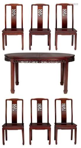 A fine Chinese rosewood extendable dining table wi…