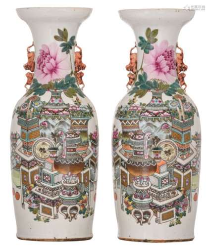 A pair of Chinese famille rose vases, decorated wi…