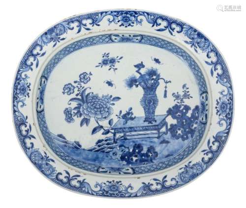 A Chinese blue and white charger, decorated with f…