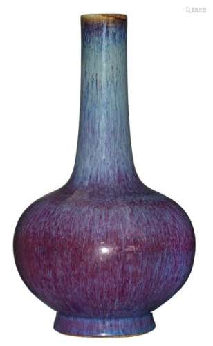 A Chinese purple flambé glazed bottle vase, marked…