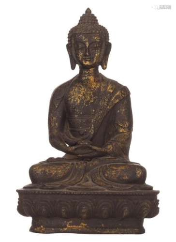 An Oriental gilt decorated bronze figure, depictin…