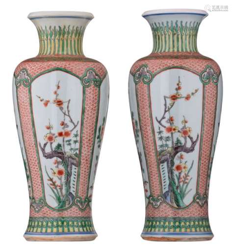 A pair of Chinese famille verte vases, the roundel…