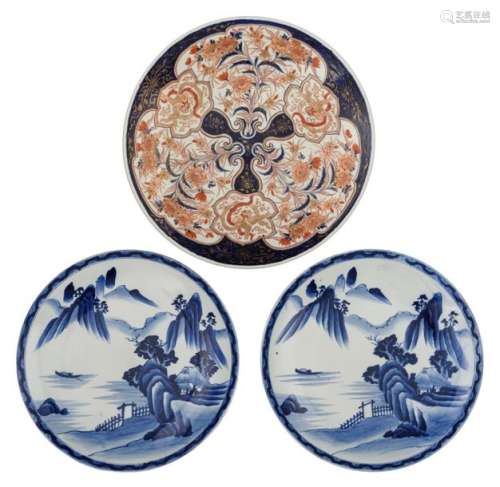Two Japanese blue and white plates, decorated with…