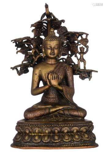 An Oriental bronze seated Buddha, the background w…