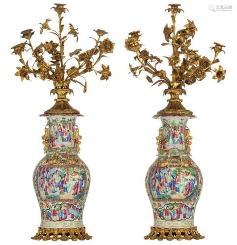 A pair of Chinese floral relief decorated Canton v…