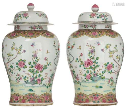 A pair of large famille rose vases and covers, dec…