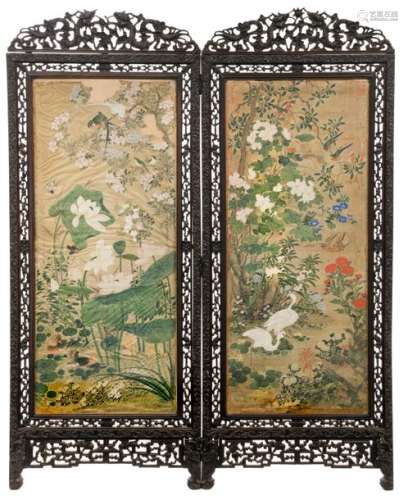 A Chinese richly carved hardwood two panel screen,…