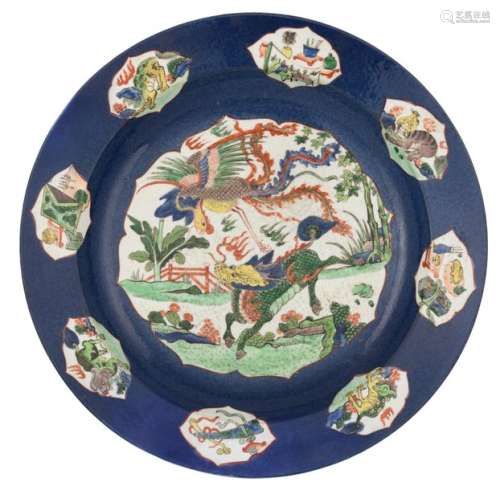 A Chinese famille verte and bleu poudré plate, the…