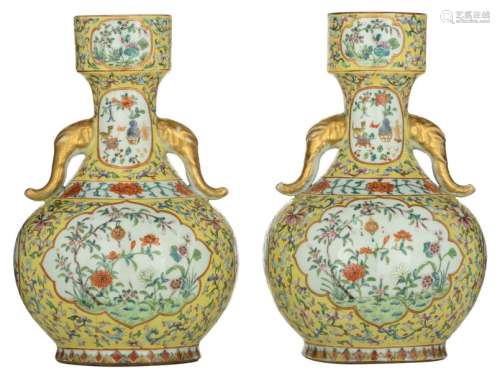 Two yellow ground bottle vases, famille rose decor…