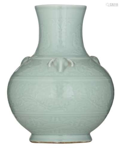 A Chinese celadon relief bottle vase, the handles …
