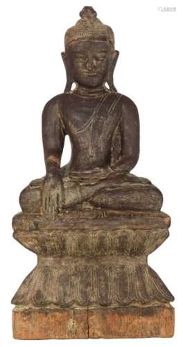 A probably Burmese seated wooden Buddha on a ditto…