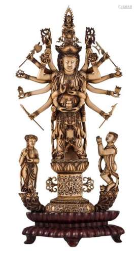 A Chinese patinated ivory carved group, depicting …