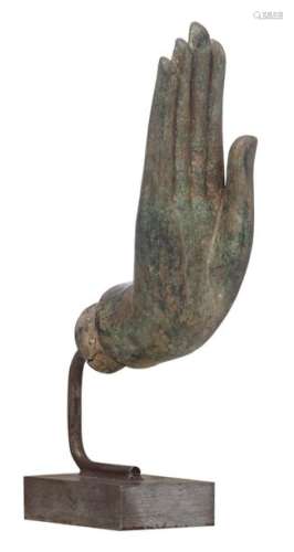 The hand of the Buddha , patinated bronze, attache…