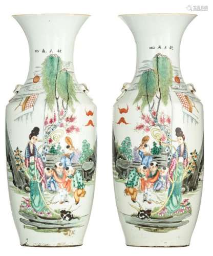 A pair of Chinese famille rose vases, decorated wi…