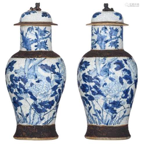 A pair of Chinese blue and white stoneware vases a…