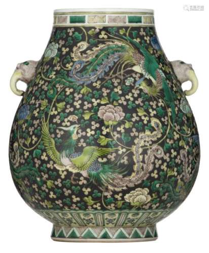 A Chinese black ground famille verte hu vase, deco…