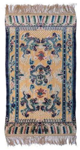 An imperial silk rug with gold thread, decorated w…