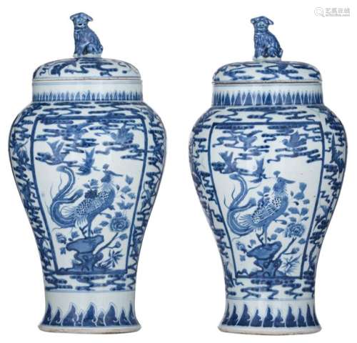A pair of Chinese blue and white vases and covers,…
