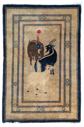 A Chinese woollen rug, decorated with goats, 195 x…