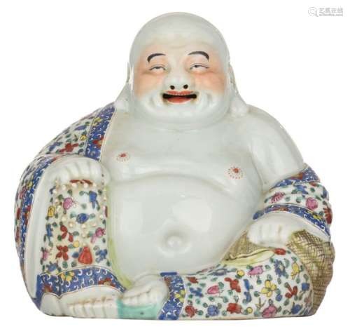 A Chinese polychrome decorated Budai, holding a ch…
