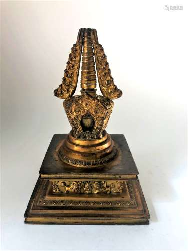 A Gilt Bronze Stupa.