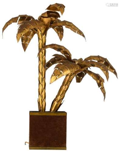 A vintage brass Maison Jansen palm tree lamp on a …