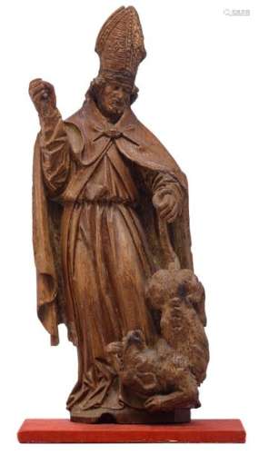 An oak sculpture of Saint Romanus of Rouen, with t…