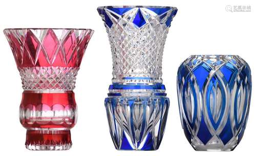 A blue and a red overlay crystal cut vase, signed …