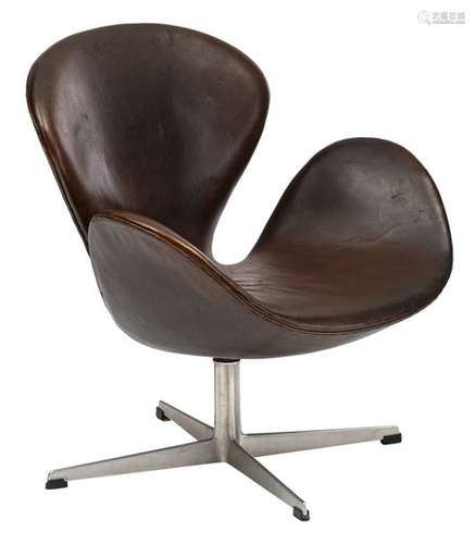 A brown leather upholstered 'Swan chair', design b…