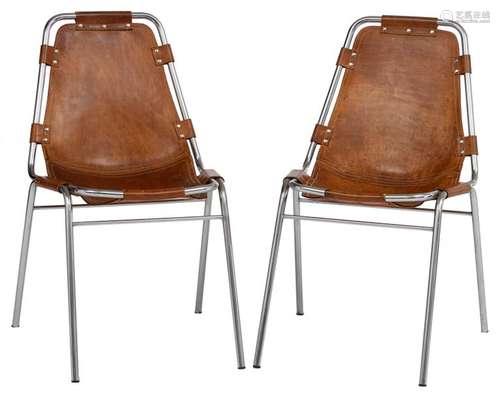 A fine pair of cognac leather upholstered 'Les Arc…