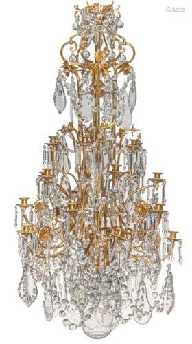 An imposing gilt bronze chandelier, royally decora…