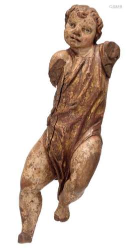 A limewood sculpture of an angel, with traces of p…